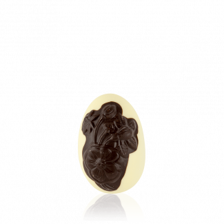 Яйце з квіткою з білого шоколаду